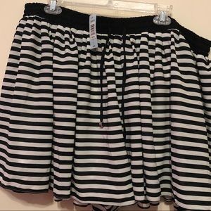 Black and White stripped shorts.